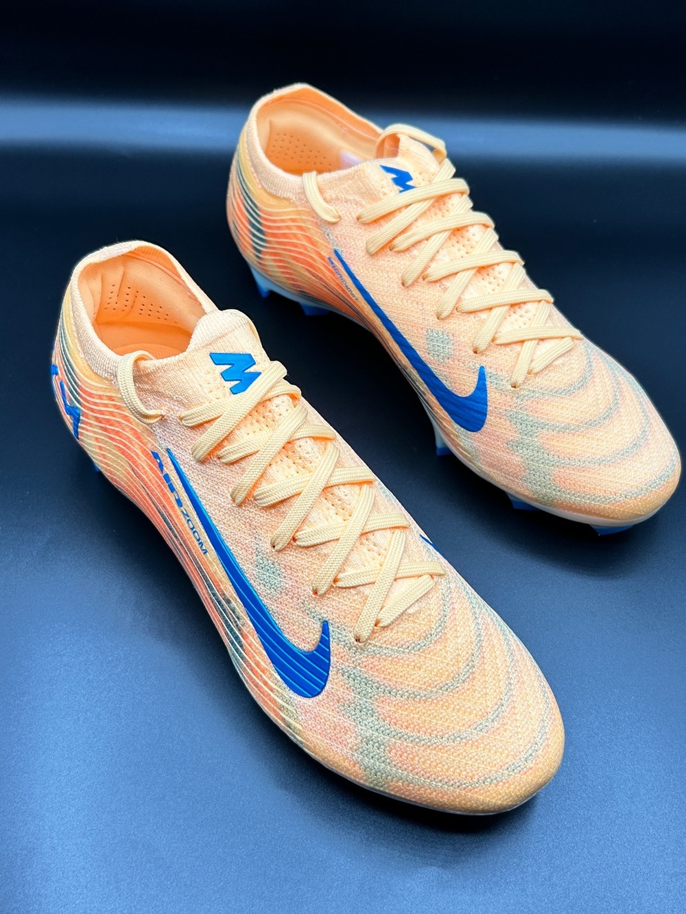 Nike men’s KM Mercurial Vapor 16 Elite FG Soccer Cleats - Peach/Orange with Blue
